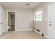 Mud room featuring neutral tile flooring and a nearby exterior door at 2582 Springdale Sw Rd, Atlanta, GA 30315