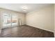 Bedroom with hardwood floors, neutral walls, glass doors that flood the space with natural light at 3184 Nectarine Cir, Decatur, GA 30034