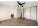 Bedroom featuring a ceiling fan and closet at 3184 Nectarine Cir, Decatur, GA 30034
