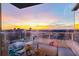Spacious outdoor balcony with comfortable seating offering breathtaking sunset city views at 45 Ivan Allen Jr Nw Blvd # 2505, Atlanta, GA 30308