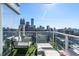 Relaxing balcony space featuring comfortable seating and stunning skyline views at 45 Ivan Allen Jr Nw Blvd # 2505, Atlanta, GA 30308