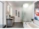 Bright bathroom with a freestanding tub, frosted glass shower, and chic vanity at 45 Ivan Allen Jr Nw Blvd # 2505, Atlanta, GA 30308