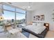 Bright bedroom with city views, platform bed, and contemporary decor elements at 45 Ivan Allen Jr Nw Blvd # 2505, Atlanta, GA 30308