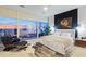 Modern bedroom with floor-to-ceiling windows showcasing city views, chic decor, and king bed at 45 Ivan Allen Jr Nw Blvd # 2505, Atlanta, GA 30308