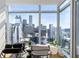 Expansive windows offer breathtaking city views in this light-filled penthouse suite at 45 Ivan Allen Jr Nw Blvd # 2505, Atlanta, GA 30308
