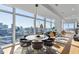 Light-filled dining area featuring city views, a marble table, and stylish seating at 45 Ivan Allen Jr Nw Blvd # 2505, Atlanta, GA 30308