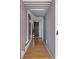Hallway with wooden floors, outlined with decorative borders and enhanced lighting at 45 Ivan Allen Jr Nw Blvd # 2505, Atlanta, GA 30308