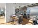 Contemporary kitchen with stainless appliances, granite countertops, and island with bar seating at 45 Ivan Allen Jr Nw Blvd # 2505, Atlanta, GA 30308
