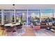 Open living space with modern decor, floor-to-ceiling windows, and stunning city views at 45 Ivan Allen Jr Nw Blvd # 2505, Atlanta, GA 30308
