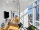 Bright and airy living area featuring floor to ceiling windows showcasing city views and contemporary design at 45 Ivan Allen Jr Nw Blvd # 2505, Atlanta, GA 30308