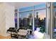 Modern living room featuring a stunning city view, stylish seating, and unique decor at 45 Ivan Allen Jr Nw Blvd # 2505, Atlanta, GA 30308