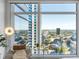 Relaxing space with chair and stunning city view from the expansive window, offering bright natural light at 45 Ivan Allen Jr Nw Blvd # 2505, Atlanta, GA 30308