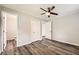 Spacious bedroom with hardwood floors and natural light, including closet space at 62 Sunny Ln, Villa Rica, GA 30180