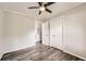 Inviting bedroom with hardwood floors, and closet and en suite access at 62 Sunny Ln, Villa Rica, GA 30180
