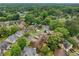 An aerial view of a neighborhood full of tree cover at 1237 Hunters Dr, Stone Mountain, GA 30083