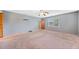 Large bedroom with neutral paint and plush carpeting, ready for personalization at 1237 Hunters Dr, Stone Mountain, GA 30083