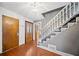 Inviting foyer with staircase and doors to living spaces at 1237 Hunters Dr, Stone Mountain, GA 30083