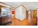 Kitchen with stainless steel refrigerator and wood cabinetry at 1237 Hunters Dr, Stone Mountain, GA 30083