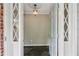 Open foyer with beautiful stone floors and decorative lighting at 1215 Vista Leaf Dr, Decatur, GA 30033