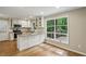 Spacious kitchen with granite counters, stainless appliances, a breakfast bar and picturesque outdoor views at 1215 Vista Leaf Dr, Decatur, GA 30033