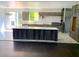 Modern kitchen with stainless steel appliances, center island, and ample counter space at 168 Harmony Grove Rd, Lilburn, GA 30047