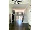 Grand living room showcasing a staircase and hardwood floors at 168 Harmony Grove Rd, Lilburn, GA 30047