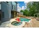 Backyard featuring inground pool, spa, lounge chairs, and outdoor pergola at 2637 Morningside Nw Trl, Kennesaw, GA 30144