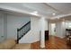 Finished basement with a staircase and fireplace, offering versatile living space at 2637 Morningside Nw Trl, Kennesaw, GA 30144