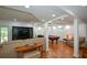 Finished basement features a pool table and a TV, perfect for entertaining guests at 2637 Morningside Nw Trl, Kennesaw, GA 30144