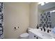 Bathroom featuring a white vanity, toilet, and shower with black and white curtain at 2637 Morningside Nw Trl, Kennesaw, GA 30144
