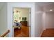 Bedroom entrance view showcases hardwood floors, tray ceiling, and a cozy sitting area at 2637 Morningside Nw Trl, Kennesaw, GA 30144