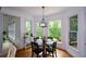 Cozy dining area with natural light and view of a lush exterior at 2637 Morningside Nw Trl, Kennesaw, GA 30144