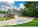 Beautiful two-story home with brick accents, a spacious driveway, and lush green lawn at 2637 Morningside Nw Trl, Kennesaw, GA 30144