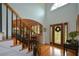 Elegant foyer boasts a tall, bright entry, complemented by hardwood floors and an inviting staircase at 2637 Morningside Nw Trl, Kennesaw, GA 30144