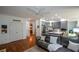 Open concept living space featuring hardwood floors and a modern kitchen with stainless steel appliances at 2637 Morningside Nw Trl, Kennesaw, GA 30144