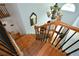 Elegant staircase with wooden steps and iron railings leading to the upper level at 2637 Morningside Nw Trl, Kennesaw, GA 30144