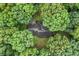 Aerial view of a secluded home surrounded by dense trees at 286 Hilton Way Way, Canton, GA 30114