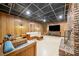 Basement area with fireplace, furniture, and large television at 286 Hilton Way Way, Canton, GA 30114