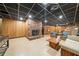 Finished basement with fireplace, furniture, and accent wall at 286 Hilton Way Way, Canton, GA 30114