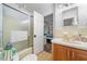 Bright bathroom with shower over tub and doorway to bedroom area at 286 Hilton Way Way, Canton, GA 30114