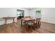 Bright dining room features hardwood floors, and a view to the living room at 286 Hilton Way Way, Canton, GA 30114
