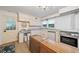 Efficient kitchen features a gas range, stainless steel appliances, and an island at 286 Hilton Way Way, Canton, GA 30114