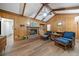 Comfortable living room with brick fireplace, vaulted ceilings and hardwood floors at 286 Hilton Way Way, Canton, GA 30114