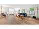 Spacious living room featuring wood flooring, light walls, and large windows for natural light at 286 Hilton Way Way, Canton, GA 30114