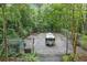 Large parking area on the property with a vintage trailer at 286 Hilton Way Way, Canton, GA 30114