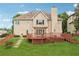 Backyard with deck and lush lawn at 3743 Lake Edge Dr, Suwanee, GA 30024