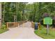 The Ivy Creek Greenway featuring a bridge walkway through a lush green area at 3743 Lake Edge Dr, Suwanee, GA 30024