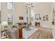 Bright living room boasts fireplace, and soaring ceilings at 3743 Lake Edge Dr, Suwanee, GA 30024