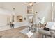 Living room with fireplace and kitchen access at 3743 Lake Edge Dr, Suwanee, GA 30024