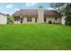 Expansive lawn with fenced in patio at 605 Pebble Blvd, Covington, GA 30016